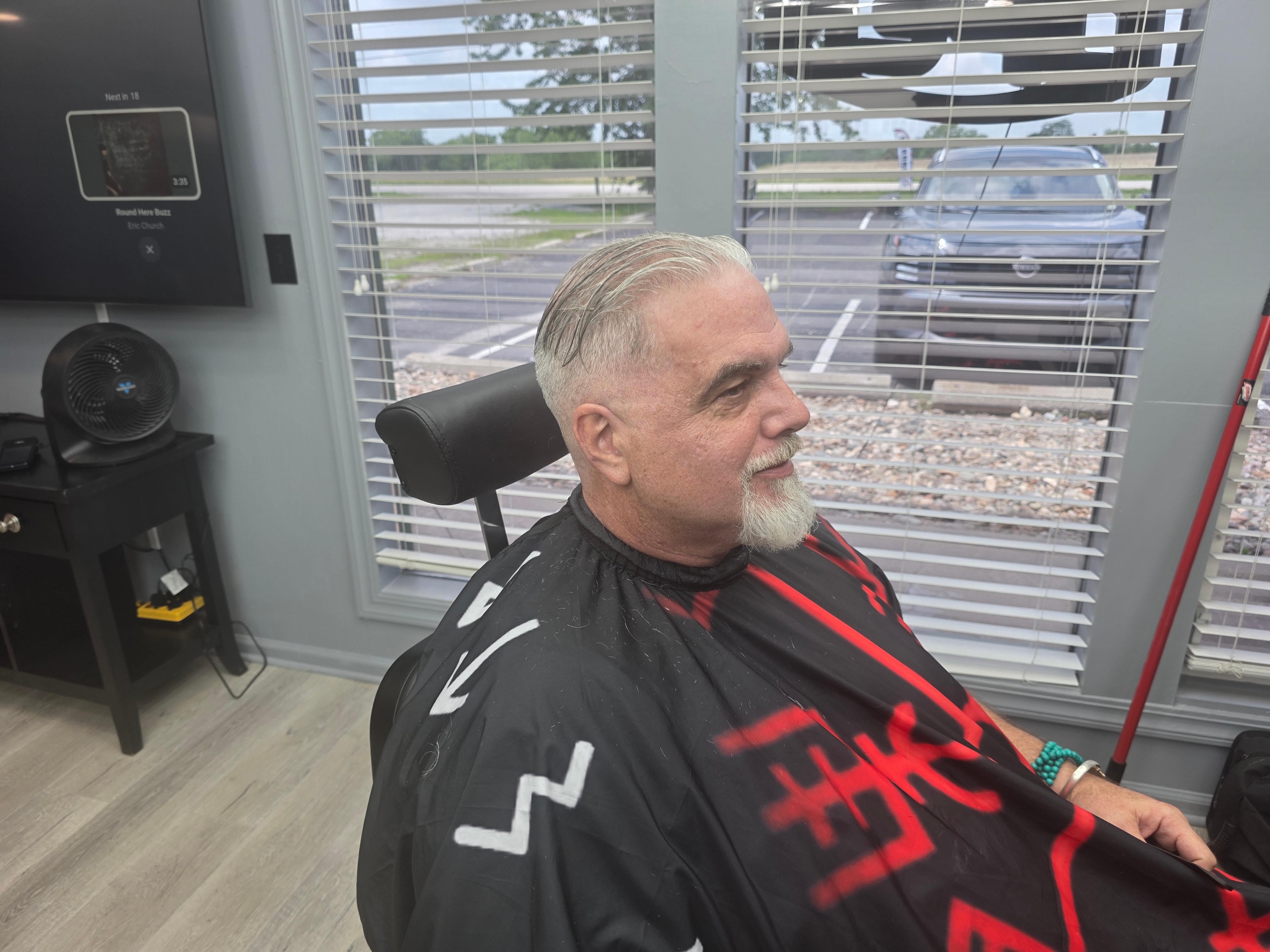 Sharp fade cut at The Bearded Axe Barber Shop